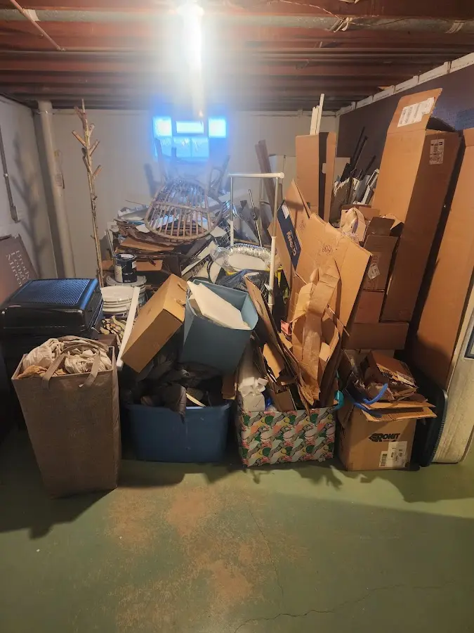 Roll-off dumpster container at job site for Yard Waste Dumpster Rental in Louisburg